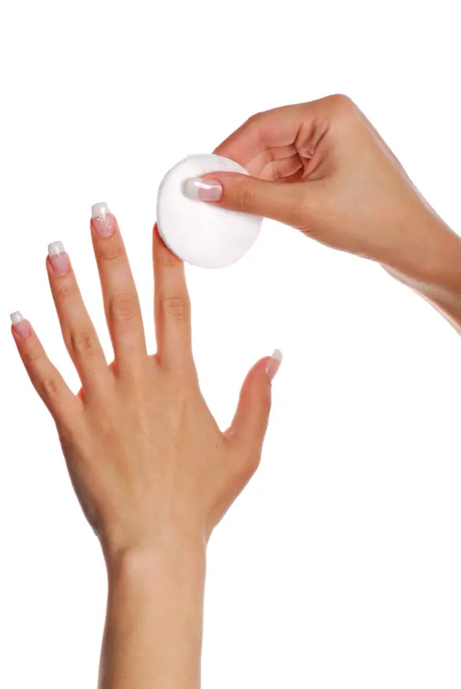 Nail Polish removal on woman's nails